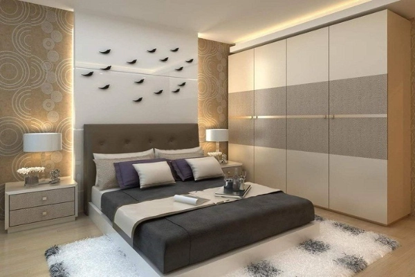 A Bedroom with accent wall and floor-to-cel=iling wardrobe