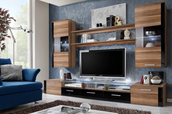 A tv unit with a hidden Dresser and lots of storage option